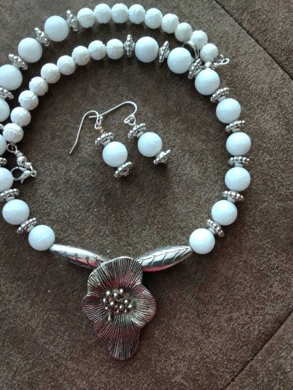 White jade necklace and earrings.
